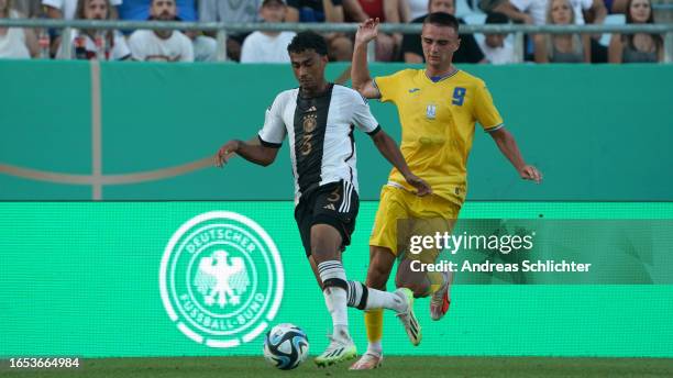 Nathaniel Brown of U21 Germany challenges Denys Tesliuk of U21 Ukraine during the International Friendly game between U21 Germany and U21 Ukraine at...