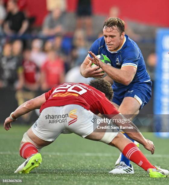 Cork , Ireland - 8 September 2023; Liam Turner of Leinster in action against Jack Daly of Munster during the pre-season friendly match between...