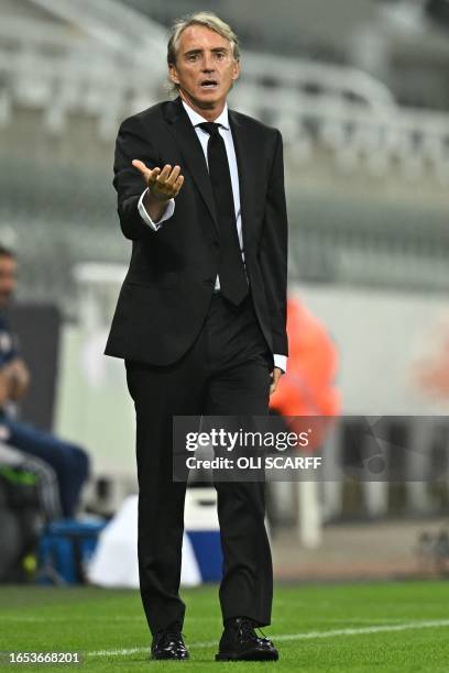 Saudi Arabia's Italian coach Roberto Mancini observes players during the international friendly football match between Saudi Arabia and Costa Rica at...