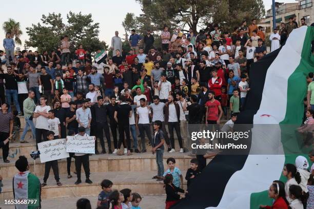 Syrians demonstrate against the Syrian regime in the city of Idlib, northern Syria, and in support of the protests in Suwayda Governorate on...