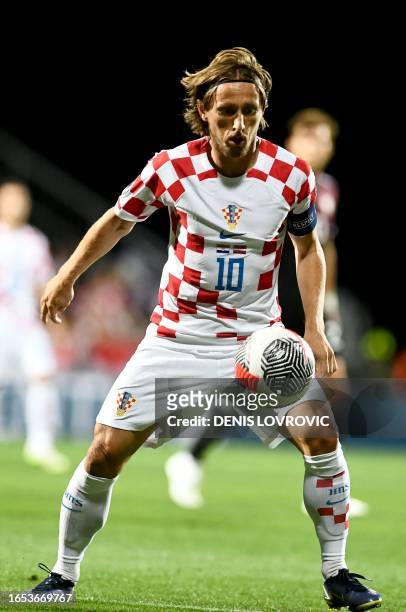 Croatia's midfielder Luka Modric controls the ball during the UEFA Euro 2024 football tournament group D qualification football match between Croatia...