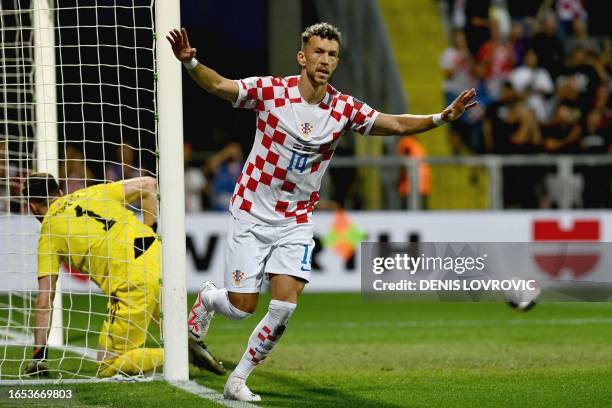 Croatia's forward Ivan Perisic celebrates scoring Croatia's first goal during the UEFA Euro 2024 football tournament group D qualification football...