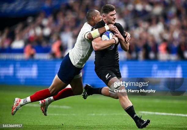 Paris , France - 8 September 2023; Dalton Papali'i of New Zealand is tackled by Gael Fickou of France during the 2023 Rugby World Cup Pool A match...