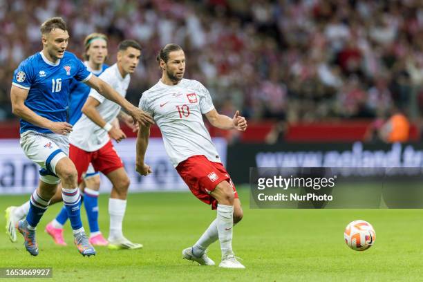 Gunnar Vatnhamar , Grzegorz Krychowiak during Poland vs Faroe Islands European EURO 2024 Qualifiers match, in Warsaw, Poland on September 7, 2023.