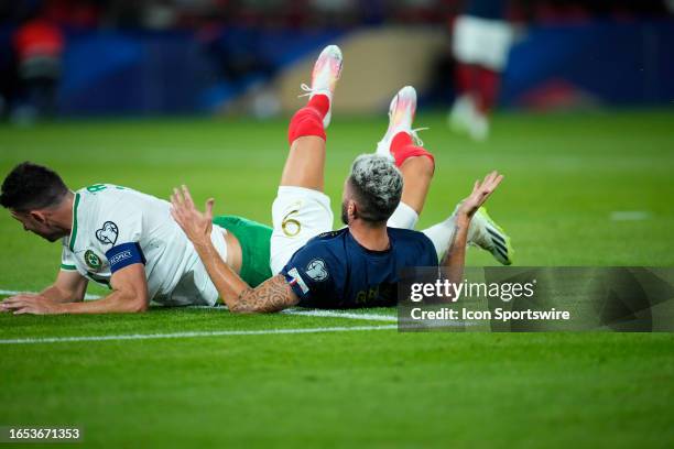 Reacts and ask for a fault after being hit in the goal zone during the UEFA EURO 2024 European qualifier match between France and Republic of Ireland...