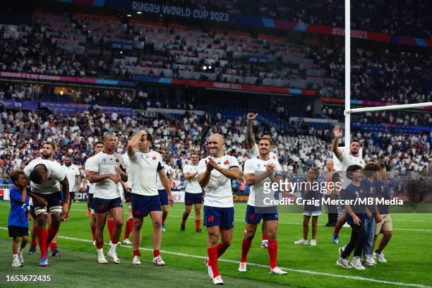 Maxime Lucu of France and team mates acknowledge the crowd after the Rugby World Cup France 2023 match between France and New Zealand at Stade de...
