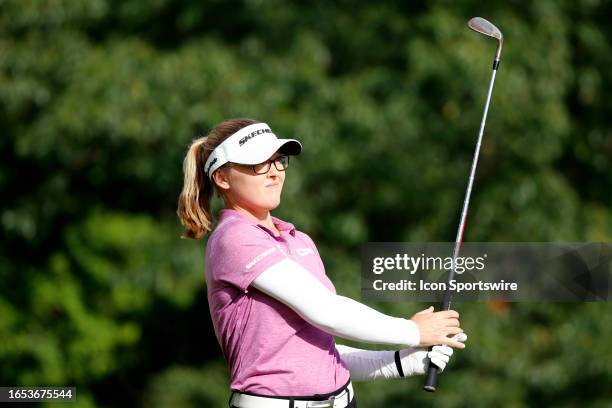 Golfer Brooke Henderson plays her tee shot on the 14th hole during the second round of the Kroger Queen City Championship at the Kenwood Country Club...