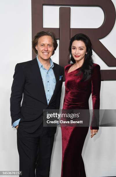 David Lauren and Li Bingbing attend the Ralph Lauren SS24 runway show during New York Fashion Week September 2023 at the Brooklyn Navy Yard on...