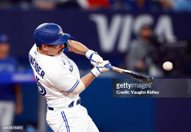 Davis Schneider of the Toronto Blue Jays hits a double in the fourth inning against the Kansas City Royals at Rogers Centre on September 08, 2023 in...