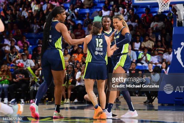 The Dallas Wings huddle up before the game against the Seattle Storm on September 8, 2023 at the College Park Center in Arlington, TX. NOTE TO USER:...