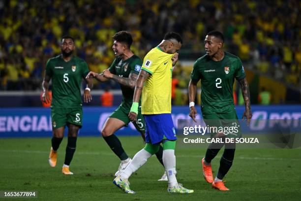 Brazil's forward Neymar reacts after missing a penalty kick during the 2026 FIFA World Cup South American qualifiers football match between Brazil...