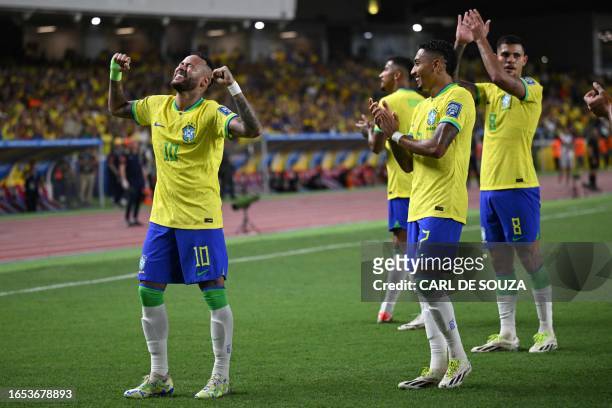 Brazil's forward Neymar celebrates with teammates after scoring a goal during the 2026 FIFA World Cup South American qualifiers football match...