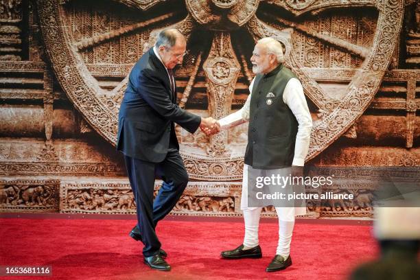 Dpatop - 09 September 2023, India, Neu Delhi: Sergei Lavrov , Foreign Minister of Russia, greeted by Narendra Modi, Prime Minister of India, at the...