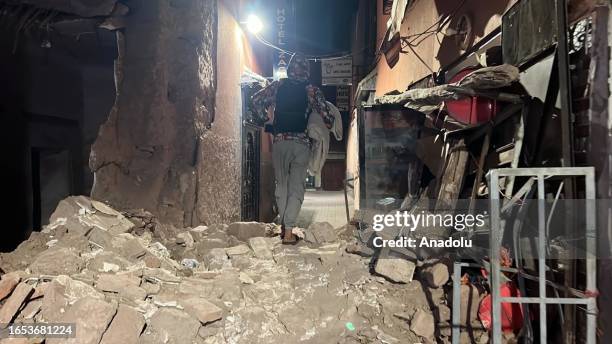 View of a person on rubble after a 7 magnitude earthquake in Marrakesh, Morocco on September 9, 2023. At least 296 people were killed and 153...