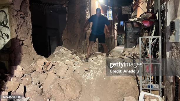 View of a man on rubble after a 7 magnitude earthquake in Marrakesh, Morocco on September 9, 2023. At least 296 people were killed and 153 sustained...