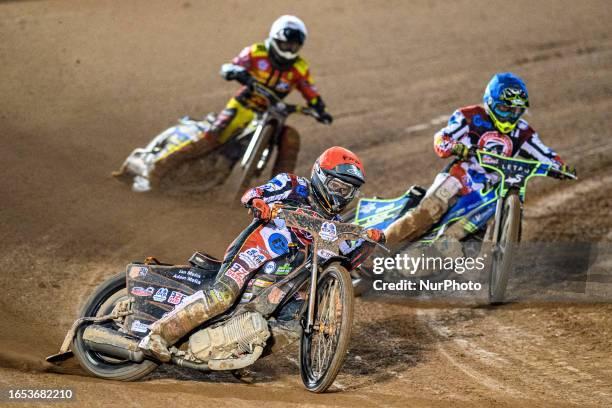 Jack Smith leads team mate Luke Muff and Joe Thompson during the National Development League match between Belle Vue Colts and Leicester Lion Cubs at...