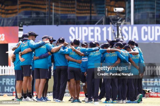 Sri Lanka players make a huddle before the start of the day Asia Cup match between Sri Lanka and Bangladesh at R. Premadasa Stadium on September 9,...