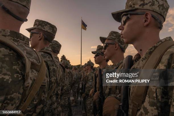 Ukrainian cadets attend a ceremony for taking the military oath at The National Museum of the History of Ukraine in the Second World War, in Kyiv, on...