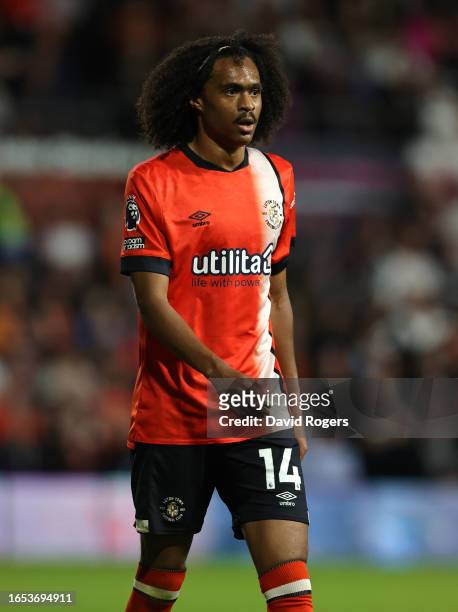 Tahith Chong of Luton Town runs with the ball during the Premier League match between Luton Town and West Ham United at Kenilworth Road on September...