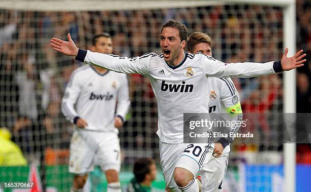 Gonzalo Higuain of Real Madrid celebrates after scoring during the UEFA Champions League Quarter Final match between Real Madrid and Galatasaray at...