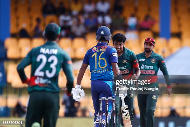 Hasan Mahmud of Bangladesh celebrates the wicket of Dimuth Karunaratne of Sri Lanka during the Asia Cup match between Sri Lanka and Bangladesh at R....