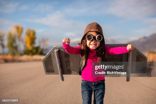 jetpack girl - toy rocket stock pictures, royalty-free photos & images