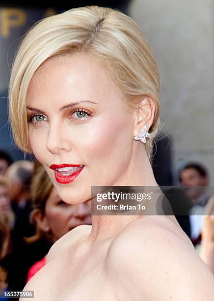 Actress Charlize Theron arrives at the 82nd Annual Academy Awards held at the Kodak Theatre on March 7, 2010 in Hollywood, California.