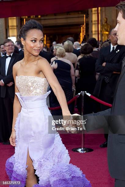 Actress Zoe Saldana and Keith Britton arrive at the 82nd Annual Academy Awards held at the Kodak Theatre on March 7, 2010 in Hollywood, California.