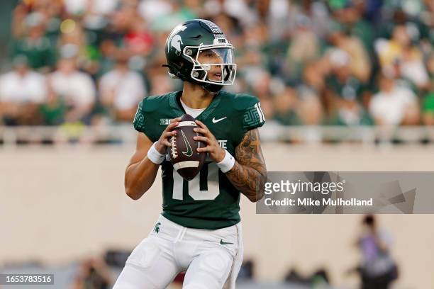 Noah Kim of the Michigan State Spartans looks to throw a pass in the first quarter of a game against the Central Michigan Chippewas at Spartan...