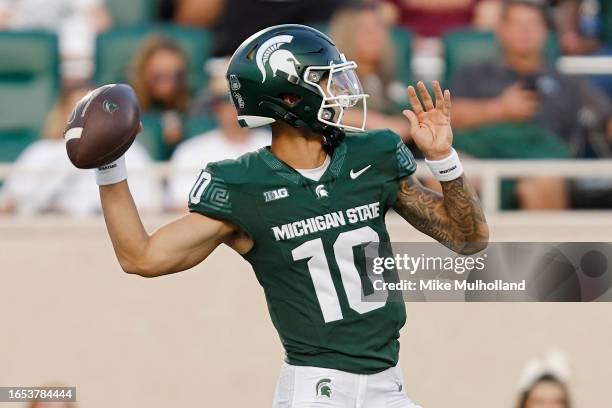 Noah Kim of the Michigan State Spartans throws a pass in the first quarter of a game against the Central Michigan Chippewas at Spartan Stadium on...