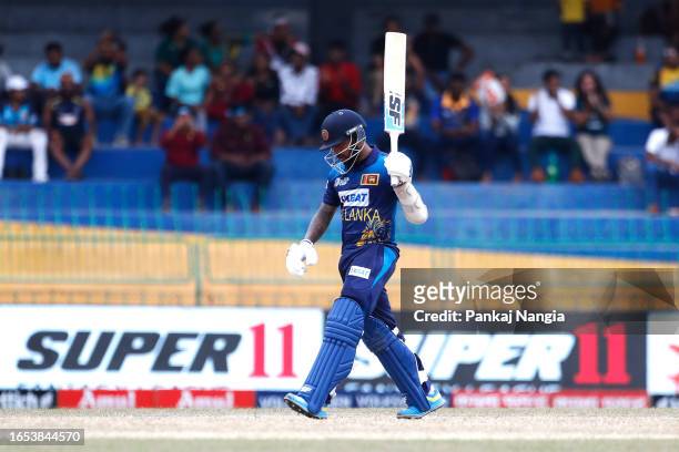 Kusal Mendis of Sri Lanka celebrates after scoring a fifty during the Asia Cup match between Sri Lanka and Bangladesh at R. Premadasa Stadium on...