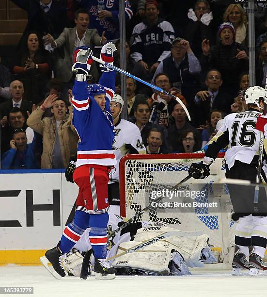 Ryane Clowe of the New York Rangers celebrates his first goal as a Ranger and first goal of the season at 14:19 of the first period against...