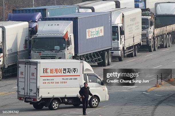 South Korean trucks return back after they were banned access to Kaesong joint industrial complex in North Korea, at the inter -Korean transit office...