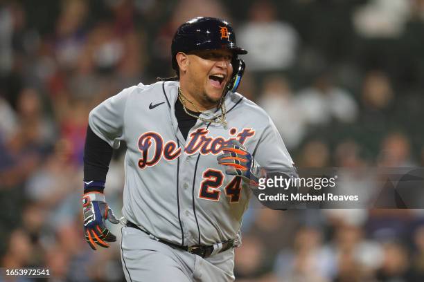Miguel Cabrera of the Detroit Tigers reacts after hitting a single, the 3,154 hit of his career, during the eighth inning against the Chicago White...