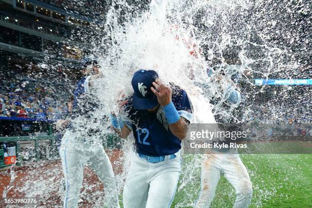 Nick Loftin of the Kansas City Royals has water dumped on him by teammates while celebrating after defeating the Boston Red Sox at Kauffman Stadium...
