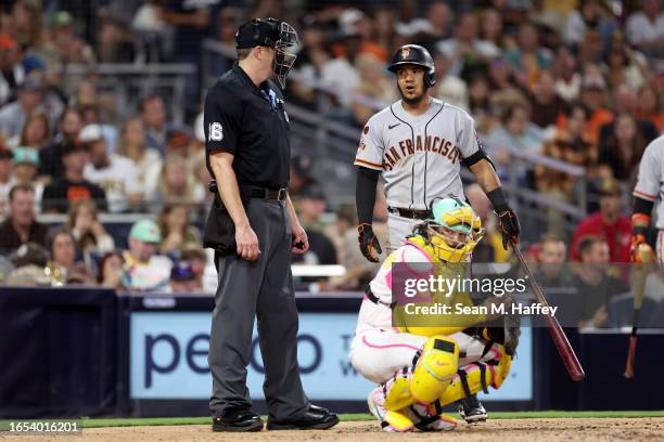 Thairo Estrada of the San Francisco Giants argues with homeplate umpire umpire Lance Barrett after striking out during the sixth inning of a game...