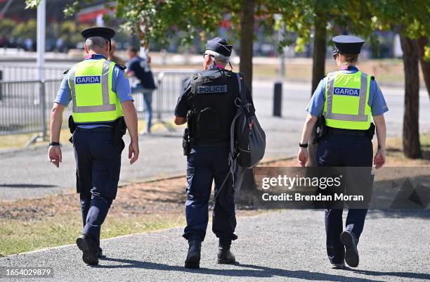 Bordeaux , France - 9 September 2023; Members of An Garda Síochána, Irish police, patrol the perimeter of the stadium with a member of the...