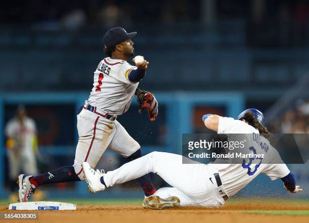 Ozzie Albies of the Atlanta Braves makes the out against James Outman of the Los Angeles Dodgers in the sixth inning at Dodger Stadium on September...