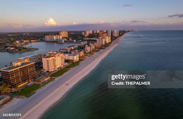 aerial drone photo naples vanderbilt beach florida, at sunset - naples beach stockfoto's en -beelden