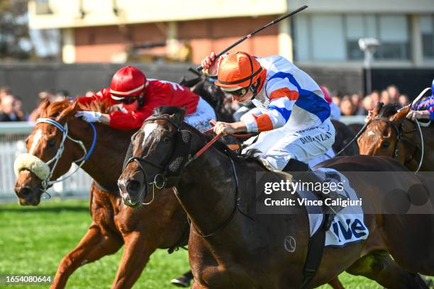 Damian Lane riding Veight defeats Jamie Kah riding Lagacies in Race 5, the Ive Mcneil Stakes, during Melbourne Racing at Caulfield Racecourse on...