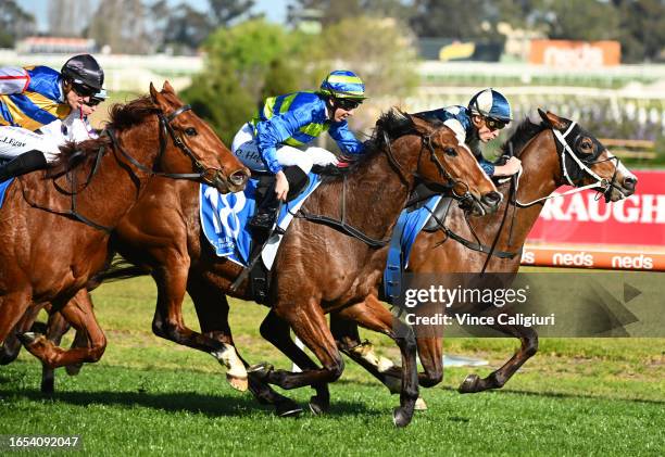 Blake Shinn riding Soulcombe defeats Carleen Hefel riding Flash Flood in Race 6, the Tile Importer Heatherlie Stakes, winning Race 7, the Tobin...