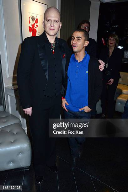 Ali Mahdavi and Djanis Bouzyani attend the Angels VS AIDS Exhibition Preview Cocktail at Hotel W on April 3, 2013 in Paris, France.