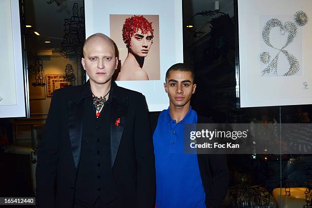 Ali Mahdavi and Djanis Bouzyani attend the Angels VS AIDS Exhibition Preview Cocktail at Hotel W on April 3, 2013 in Paris, France.