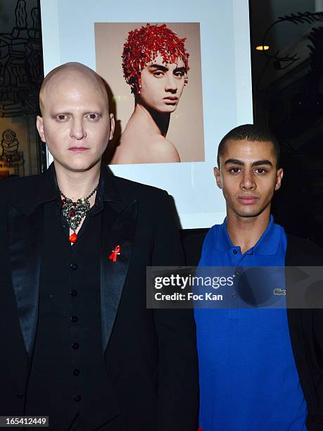 Ali Mahdavi and Djanis Bouzyani attend the Angels VS AIDS Exhibition Preview Cocktail at Hotel W on April 3, 2013 in Paris, France.