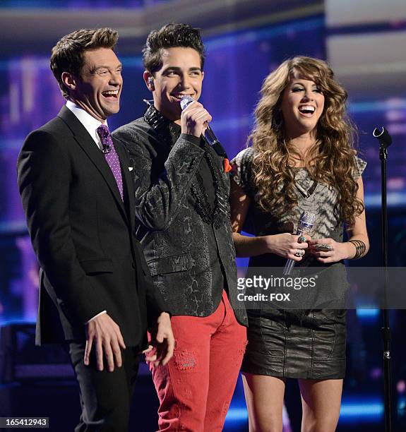 Host Ryan Seacerst and contestants Lazaro Arbos and Angie Miller onstage at FOX's "American Idol" Season 12 Top 7 Live Performance Show on April 3,...