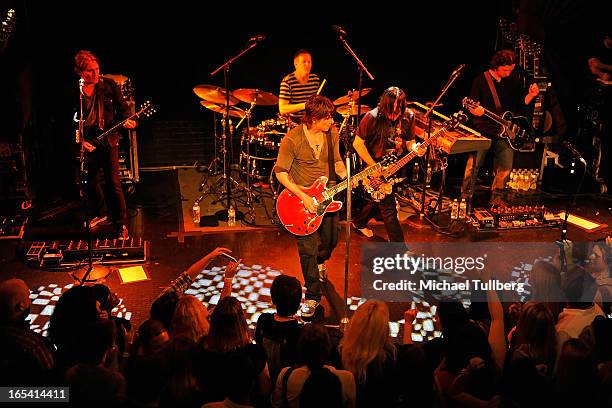 Musicians Brad Fernquist, Mike Malinin, John Rzeznik, Robby Takac and Korel Tunador of the Goo Goo Dolls perform live at Troubadour on April 3, 2013...