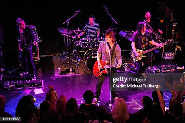 Musicians Brad Fernquist, Mike Malinin, John Rzeznik, Robby Takac and Korel Tunador of the Goo Goo Dolls perform live at Troubadour on April 3, 2013...