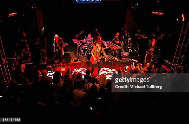 Musicians Brad Fernquist, Mike Malinin, John Rzeznik, Robby Takac and Korel Tunador of the Goo Goo Dolls perform live at Troubadour on April 3, 2013...