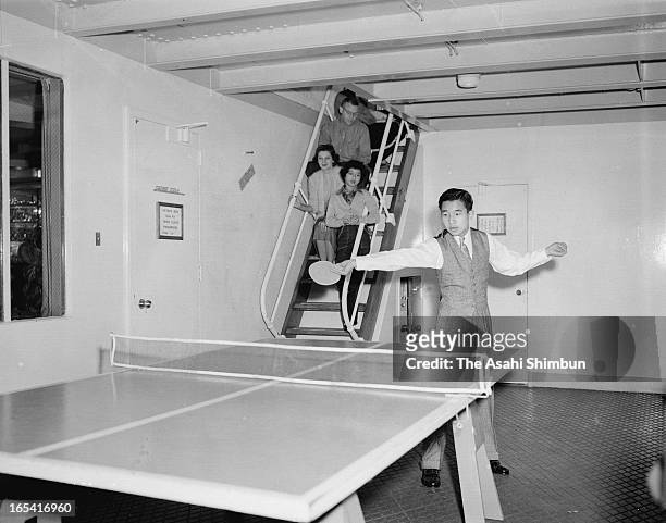 Crown Prince Akihito plays table tennis in the cruise ship President Wilson on the way to Hwaii from Yokohama on March 31, 1953. Crown Prince Akihito...