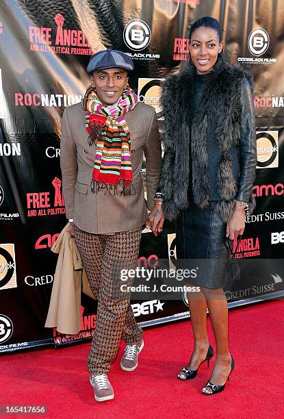 Chef Marcus Samuelsson and Gate Maya Haile attend the "Free Angela and All Political Prisoners" New York Premiere at The Schomburg Center for...